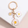 sg-11134301-7rcd5-ltuomb3p08hv8e.webp Spring Flower Enamel Keychain Daisy Plant Keyring Sweet and Romantic